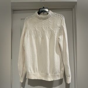 Cream long sleeve sweater. Size 10. Excellent condition.